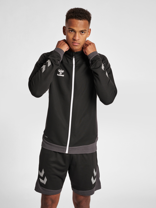 hmlLEAD POLY ZIP JACKET, BLACK, model