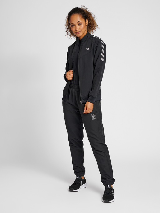 hmlGG12 TRACK JACKET WOMAN, BLACK, model