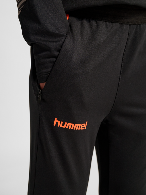 hmlBLAZE PRO TRAINING PANTS KIDS, BLACK/ORANGE, model