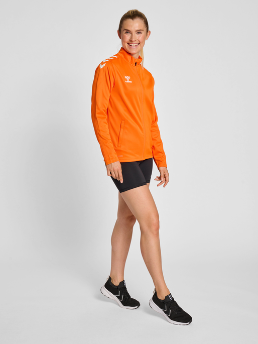 hmlCORE XK POLY ZIP SWEAT WOMAN, ORANGE TIGER, model