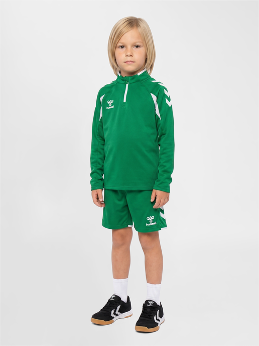 hmlCORE 2.0 SHORTS KIDS, JELLY BEAN/WHITE, model