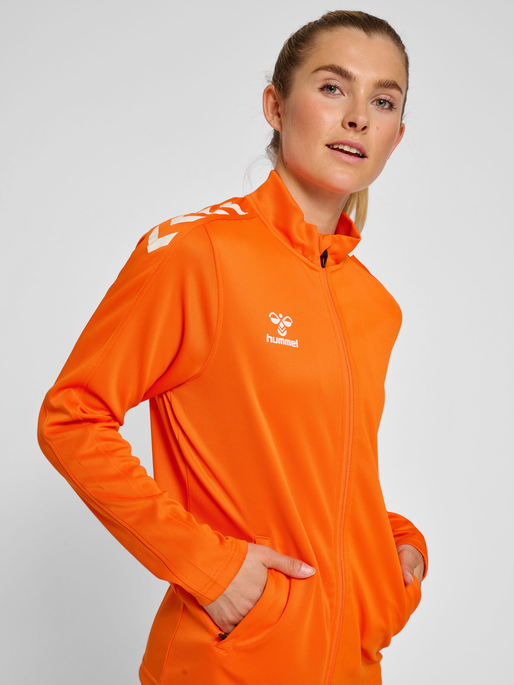 hmlCORE XK POLY ZIP SWEAT WOMAN, ORANGE TIGER, model