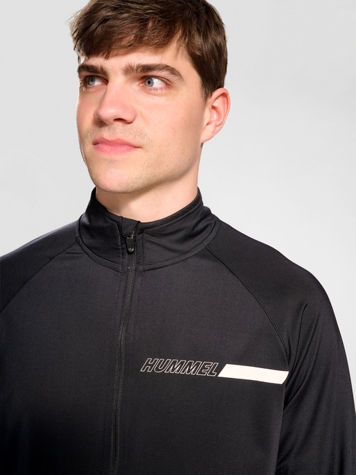 hmlTE STRENGTH TRAINING TRACK TOP, BLACK, model