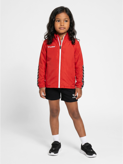 hmlAUTHENTIC KIDS MICRO JACKET, TRUE RED, model