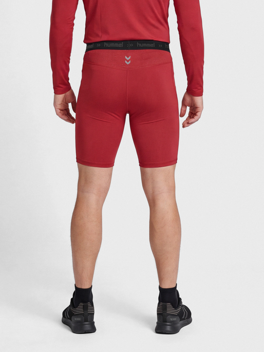 HUMMEL FIRST PERFORMANCE TIGHT SHORTS, TRUE RED, model