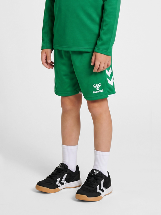hmlCORE 2.0 SHORTS KIDS, JELLY BEAN/WHITE, model