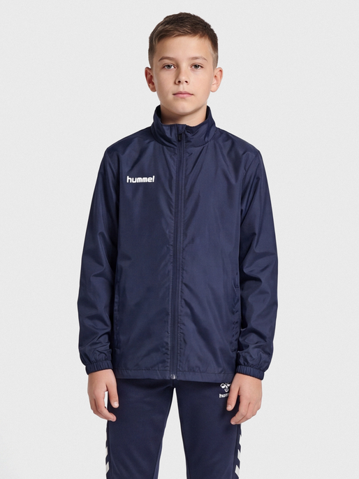 hmlPROMO RAIN JACKET KIDS, MARINE, model