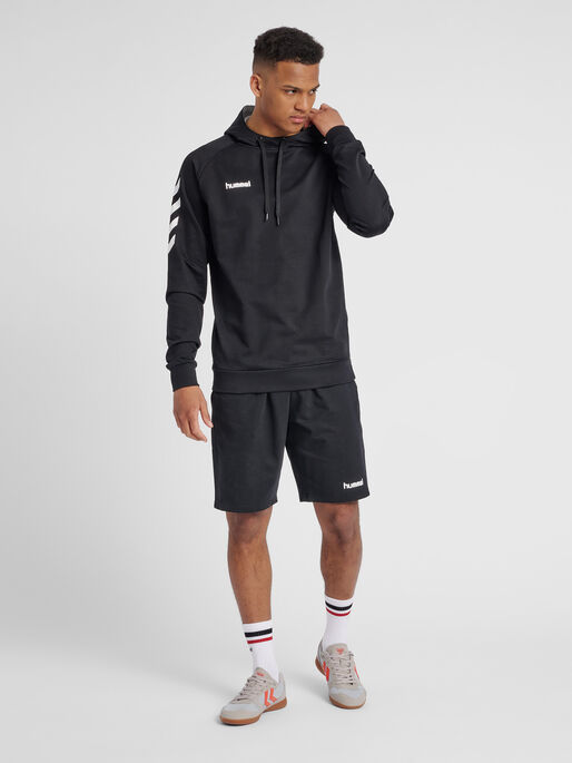 HUMMEL GO COTTON HOODIE, BLACK, model