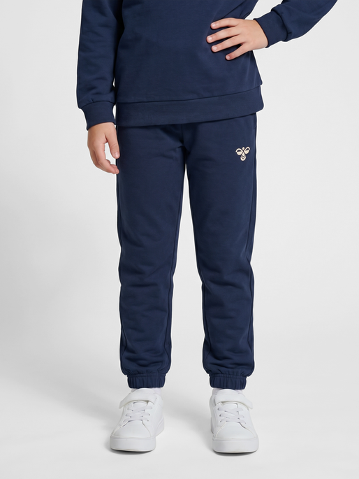 hmlJR REG TUKAS PANTS, DRESS BLUES, model