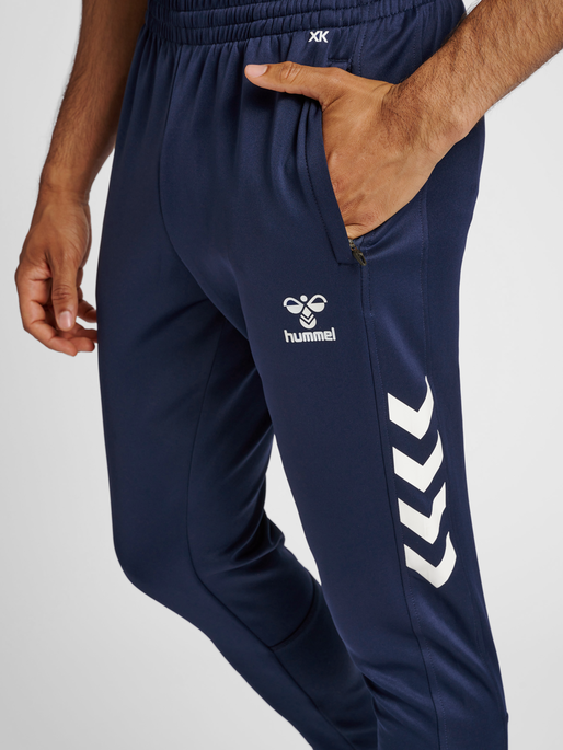 hmlCORE XK TRAINING POLY PANTS, MARINE, model