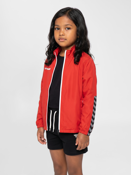 hmlAUTHENTIC KIDS MICRO JACKET, TRUE RED, model