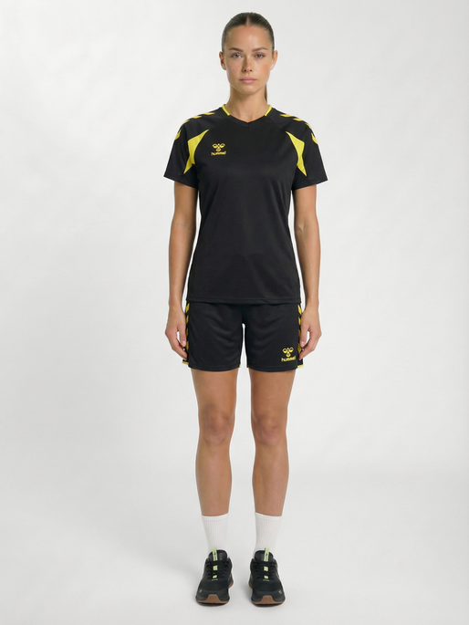 hmlCORE 2.0 JERSEY S/S WOMAN, BLACK/BLAZING YELLOW, model