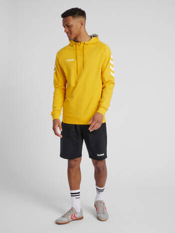 HUMMEL GO COTTON HOODIE, SPORTS YELLOW, model