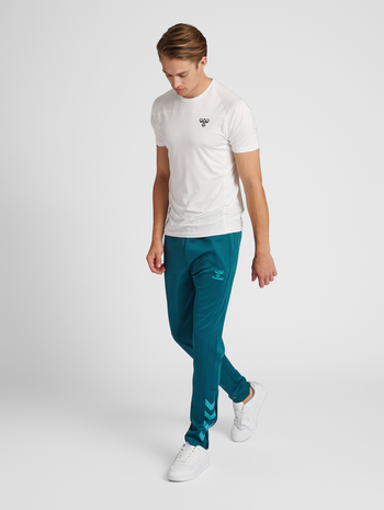 hmlCORE XK POLY PANTS, BLUE CORAL, model