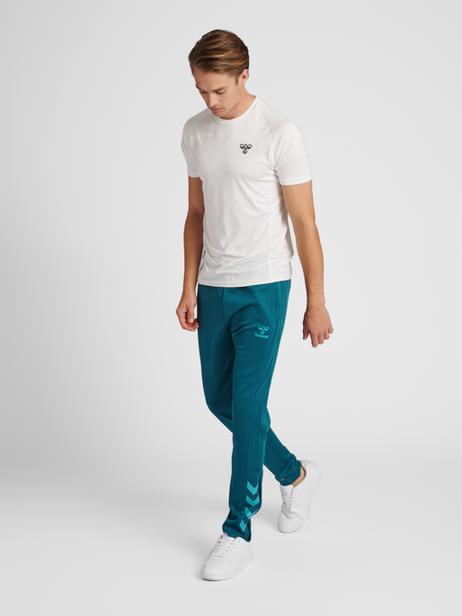 hmlCORE XK POLY PANTS, BLUE CORAL, model