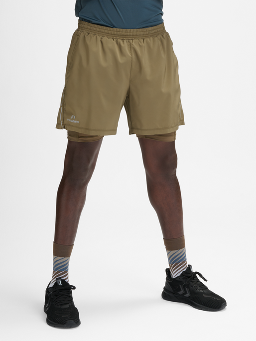 nwlFAST 2IN1 ZIP POCKET SHORTS, CAPERS, model