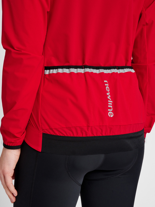 WOMENS CORE BIKE JACKET, TANGO RED, model